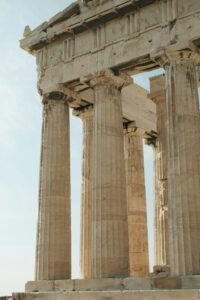 Ancient Greek columns of the Parthenon, symbolizing the reform of Greek succession law